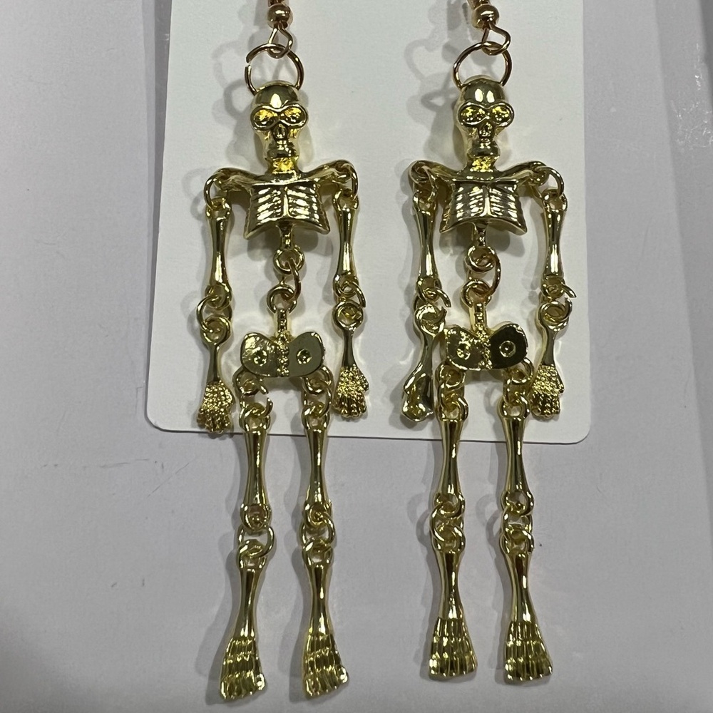 Gold skeleton earrings